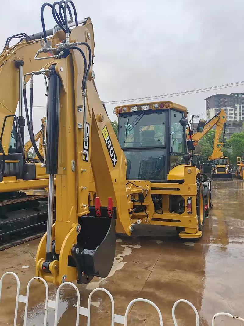JCB 3CX backhoe loader · Rear excavator boom and bucket
